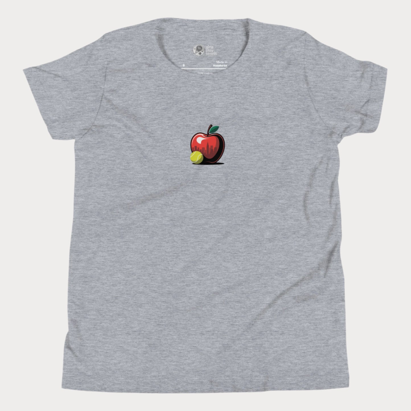 Big Apple tennis t-shirt for girls featuring apple with NYC skyline and tennis ball design.