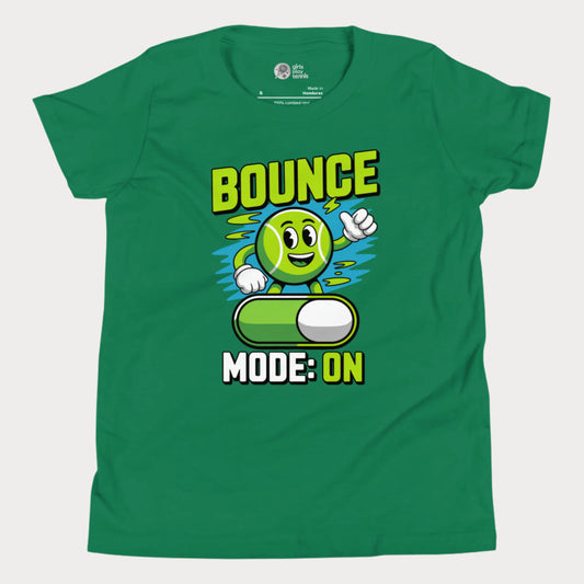 Green kids’ tennis t-shirt featuring a cartoon tennis ball with the text “Bounce Mode: ON” in green and white lettering