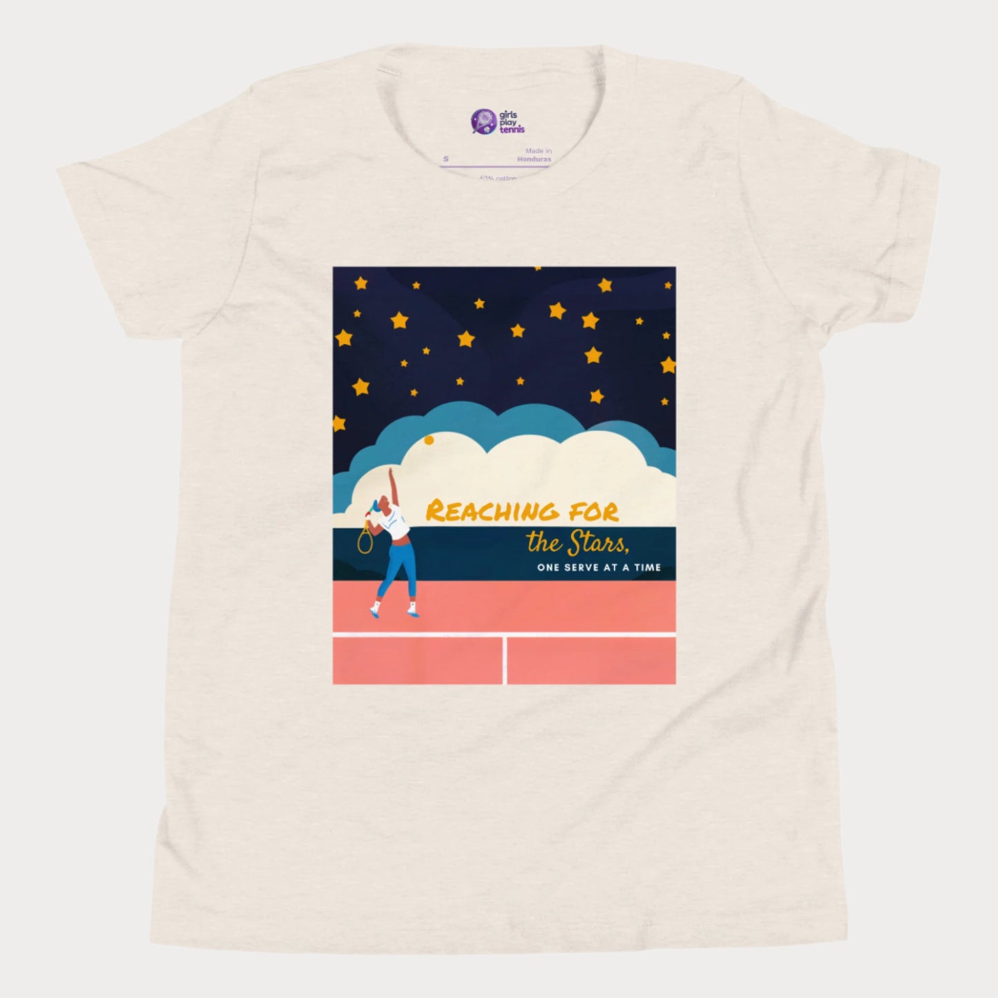Beige girls' tennis T-shirt featuring a motivational design of a young girl serving on a tennis court under a starry sky, with the phrase "Reaching for the Stars, One Serve at a Time." Perfect for young tennis players who dream big.