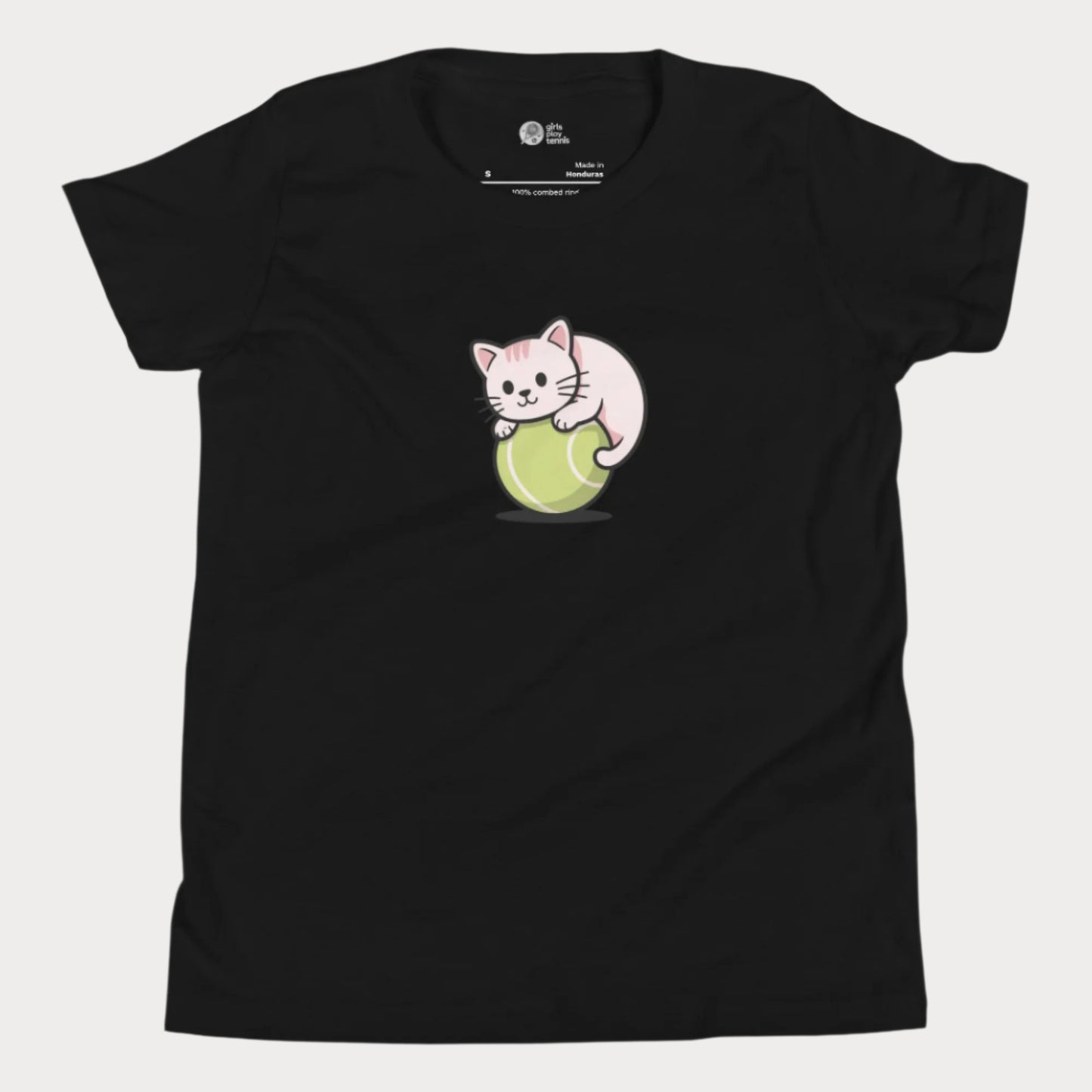 Black girls’ tennis t-shirt featuring a cute kitten playfully curled around a bright green tennis ball in the center of the chest - a fun and whimsical design perfect for young tennis players who love animals and the game.