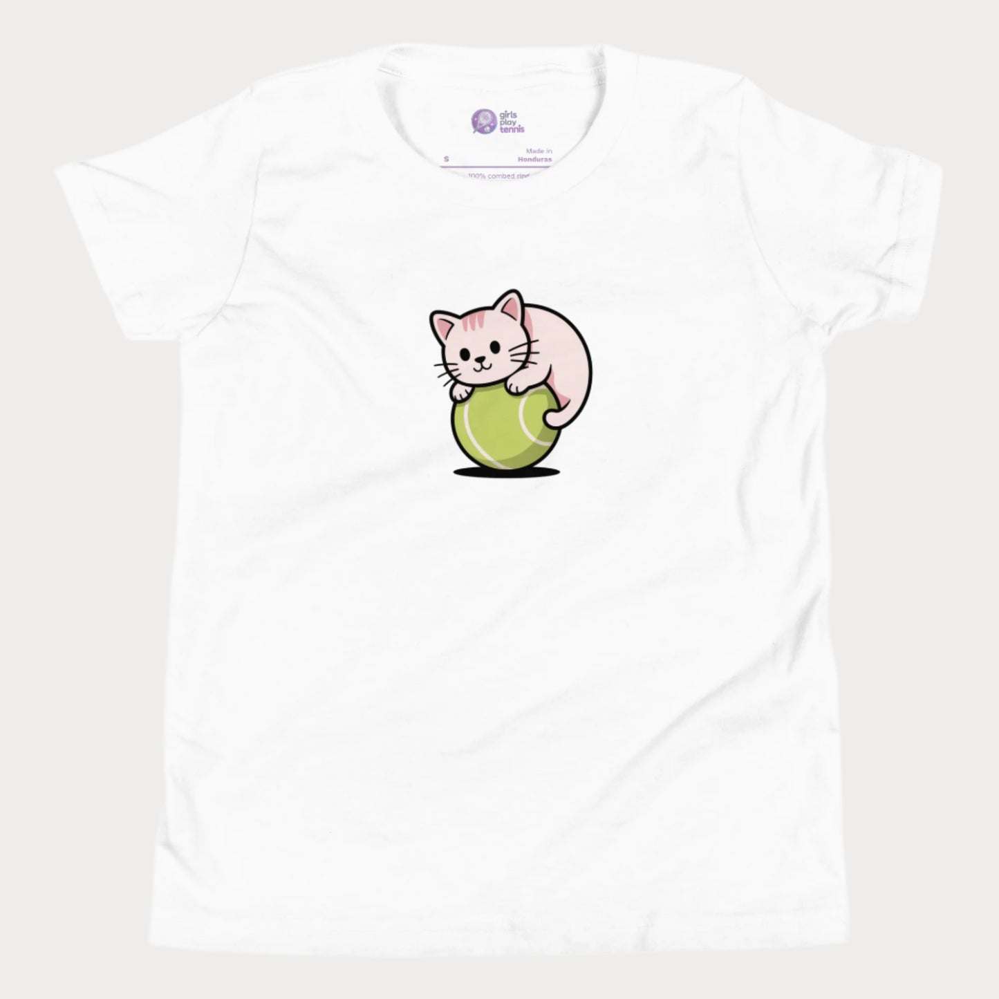 White girls’ tennis t-shirt featuring a cute kitten playfully curled around a bright green tennis ball in the center of the chest — a fun and whimsical design perfect for young tennis players who love animals and the game.