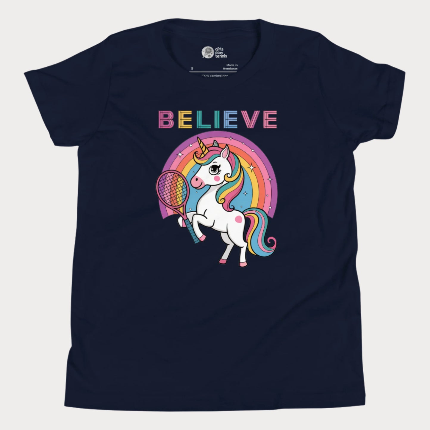 Cute navy girls' tennis t-shirt featuring a magical unicorn holding a tennis racket with a colorful rainbow backdrop. Perfect for young girls who love tennis, unicorns, and stylish sportswear.