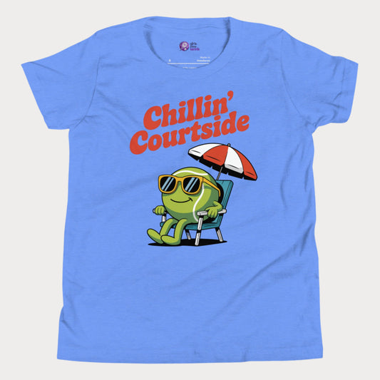 Chillin' Courtside girls tennis t-shirt with cartoon tennis ball lounging under umbrella on blue tee
