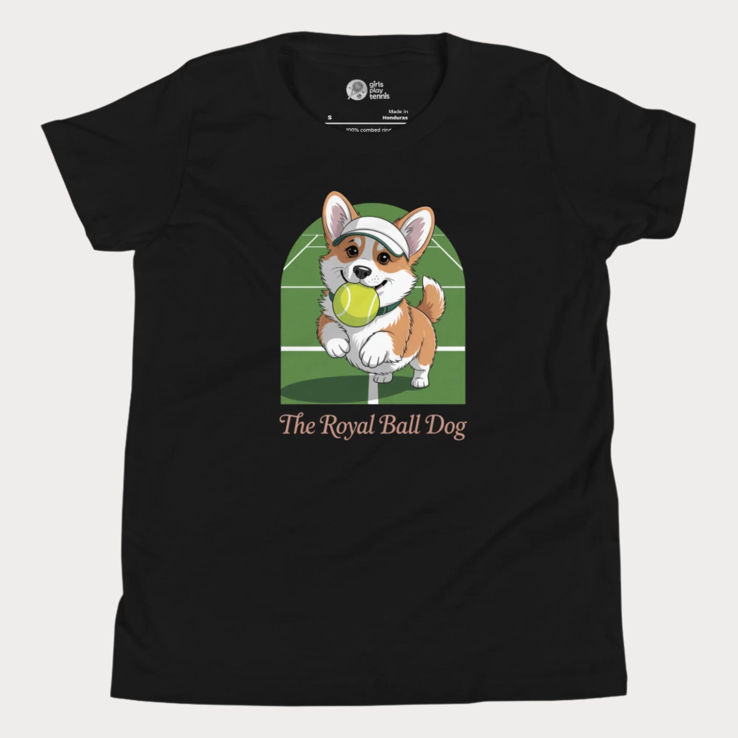 Cute girls' tennis t-shirt featuring a cartoon corgi with a tennis ball on a green grass court background, captioned "The Royal Ball Dog"