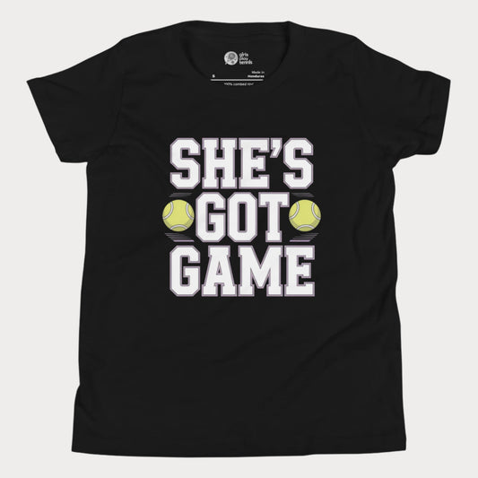 Youth tennis t-shirt with empowering slogan “She’s Got Game” and tennis ball accents.