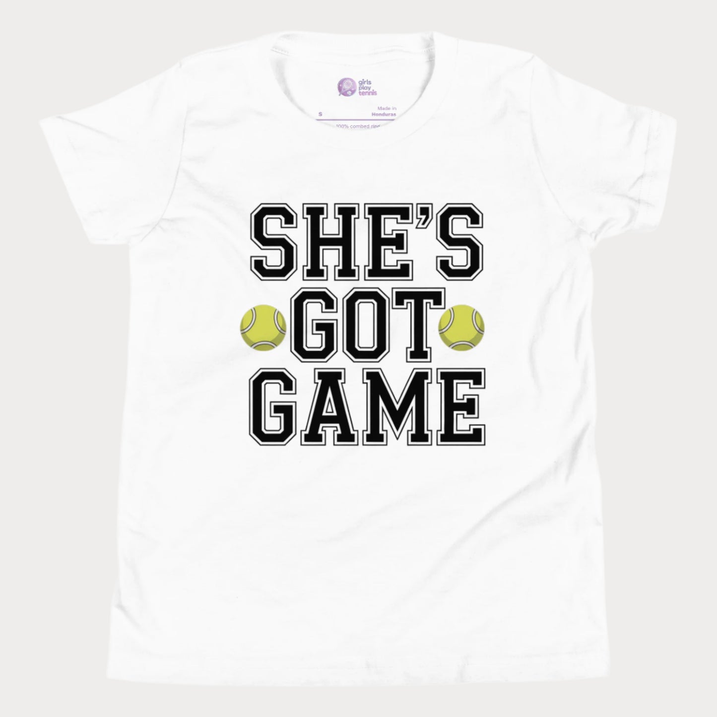 Youth tennis t-shirt with empowering slogan “She’s Got Game” and tennis ball accents.