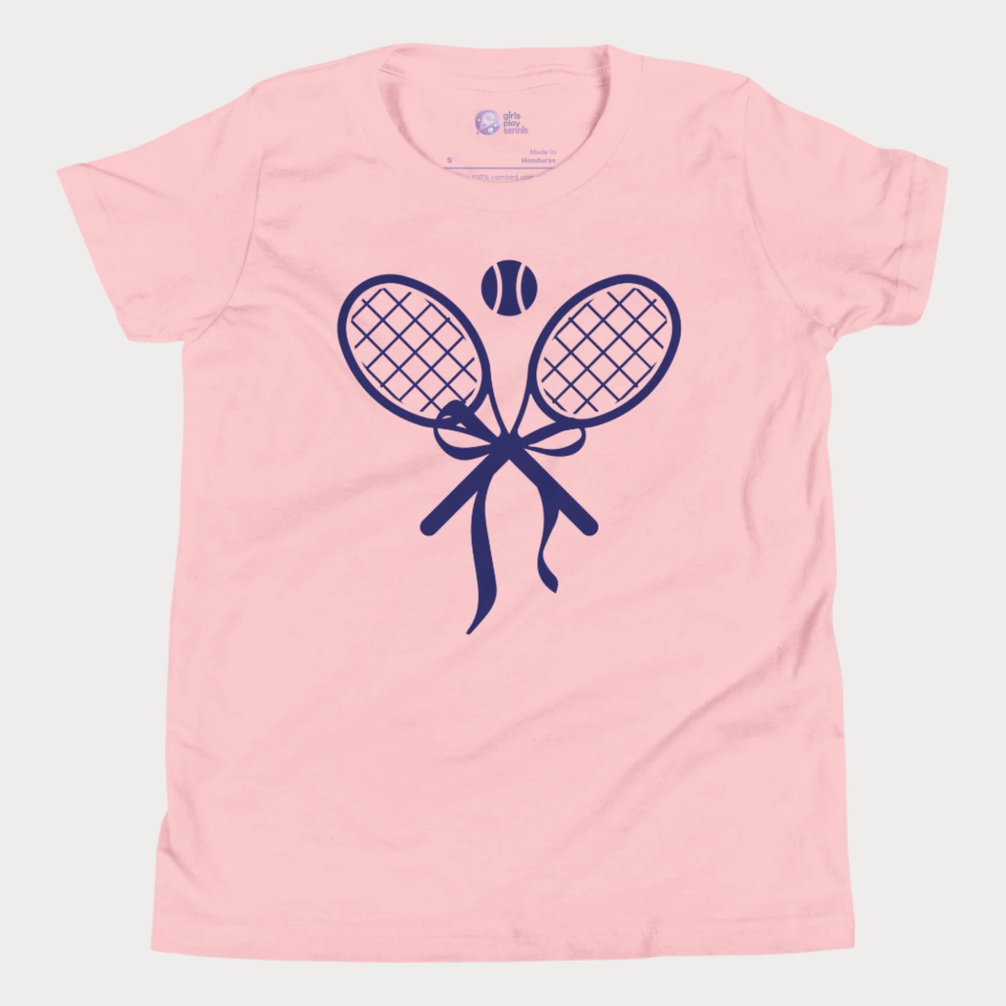 Cute girls' tennis t-shirt in berry featuring a stylish design of two crossed tennis rackets tied with a bow and a tennis ball above.