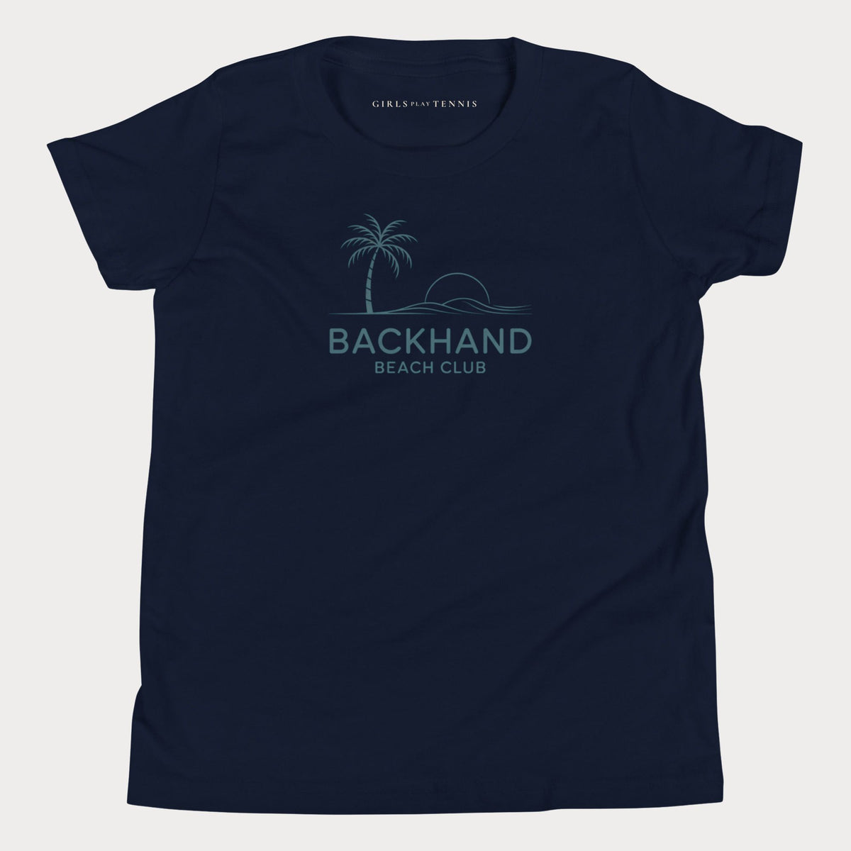 Navy Backhand Beach Club girls' tennis T-shirt with a palm tree, sun and waves graphic