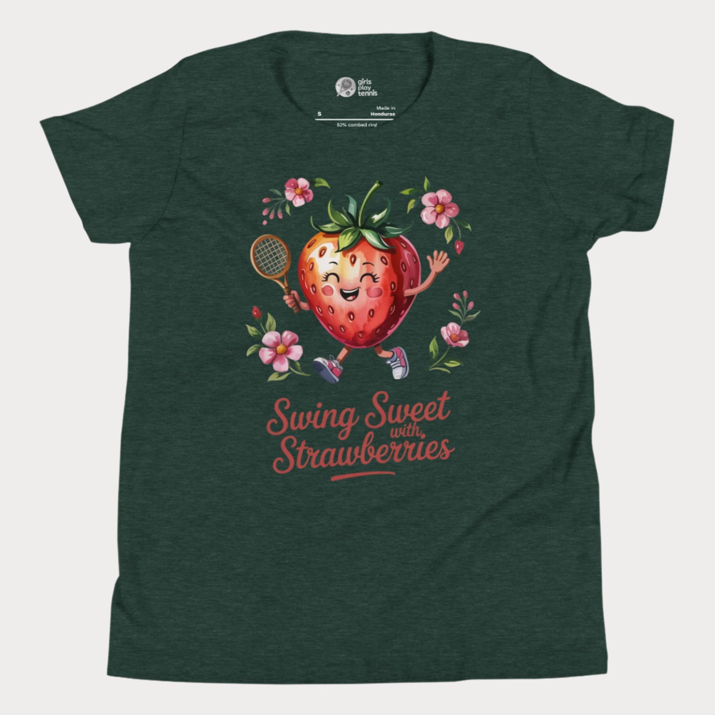 Green girls tennis t-shirt with a smiling strawberry holding a tennis racket surrounded by pink flowers and the phrase ‘Swing Sweet with Strawberries’