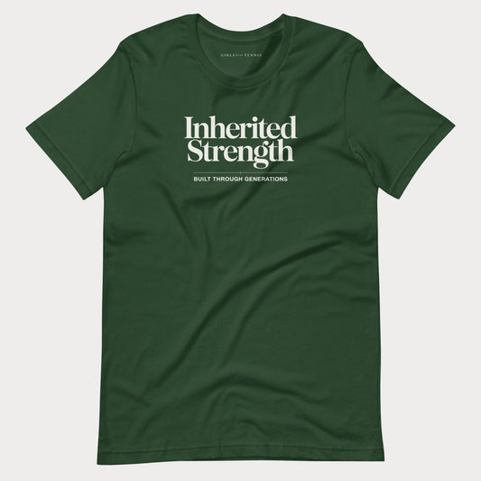 A dark green crewneck women's tennis t-shirt with white text reading 'Inherited Strength' and 'BUILT THROUGH GENERATIONS' on the chest, displayed flat against a light gray background.