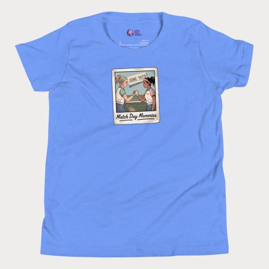 Polaroid-style illustration of two girls shaking hands on a tennis court with ‘June 1973’ and text reading Match Day Memories on a girls tennis t-shirt