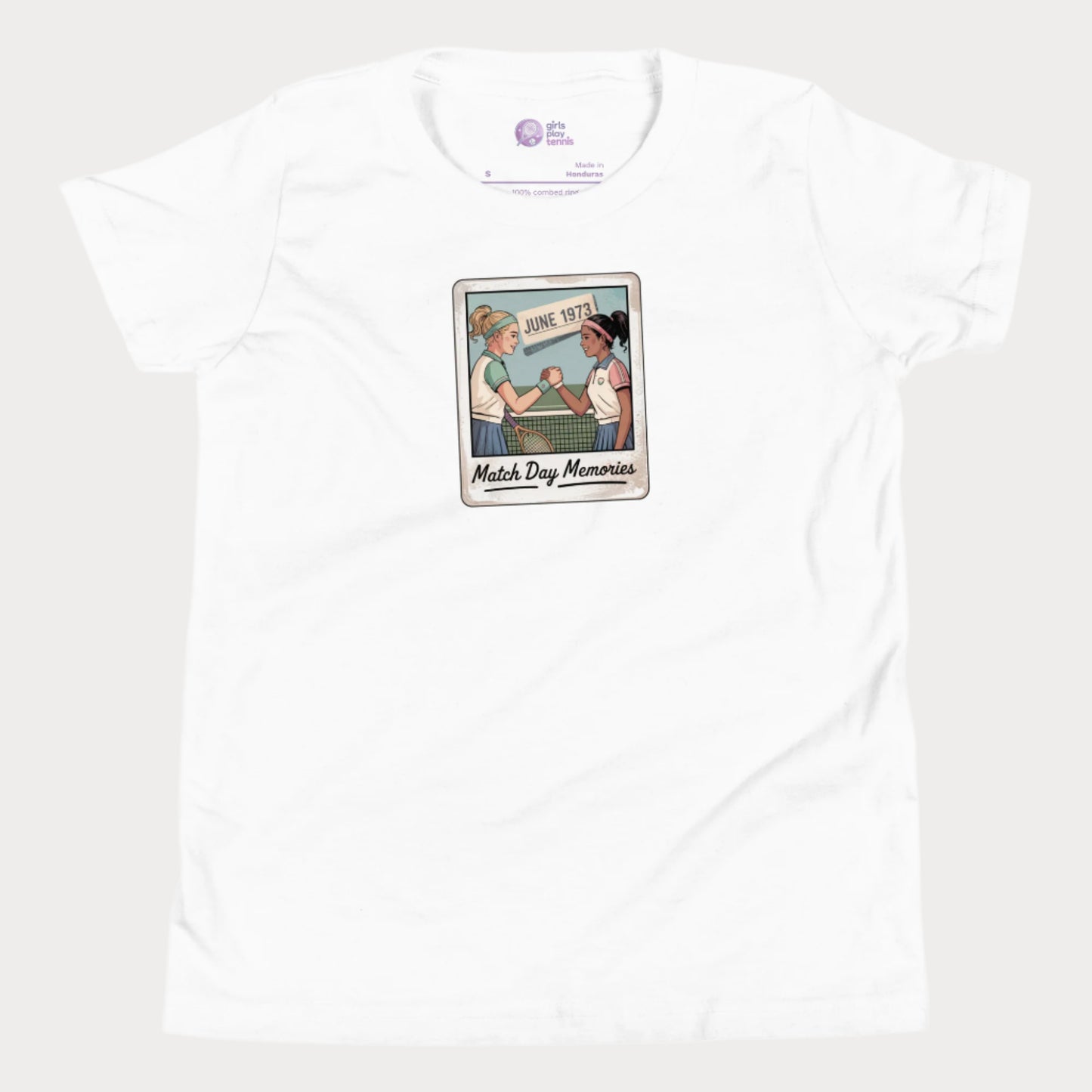 Polaroid-style illustration of two girls shaking hands on a tennis court with ‘June 1973’ and text reading Match Day Memories on a girls tennis t-shirt