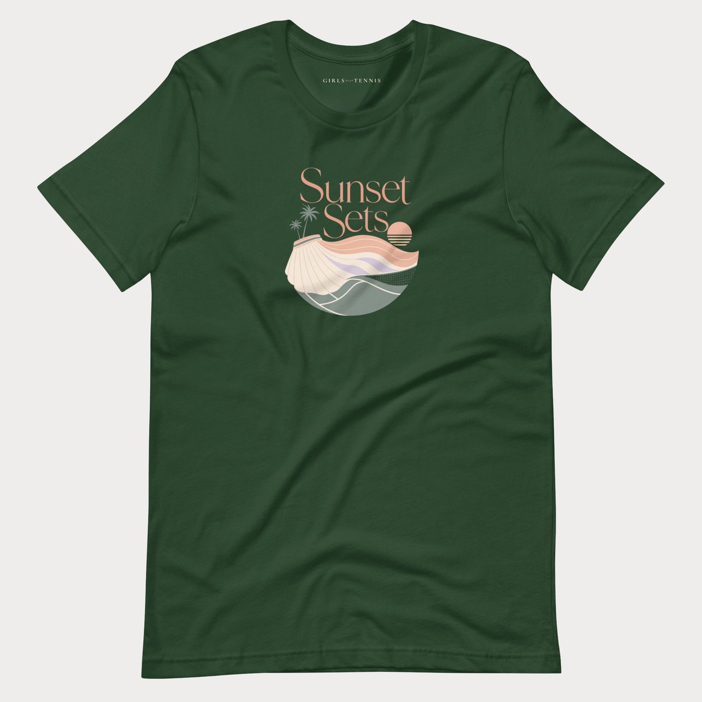 A forest green short-sleeve crewneck women's lifestyle tennis t-shirt featuring a 'Sunset Sets' graphic on the chest with a stylized beach scene and shell illustration, displayed flat against a light gray background.