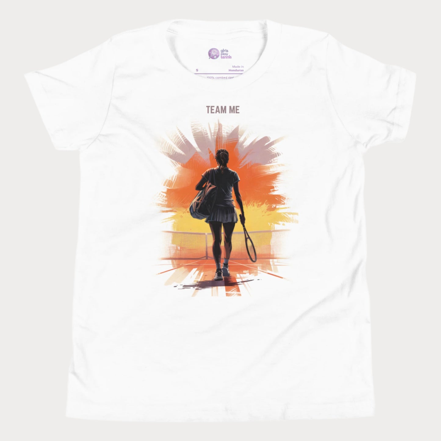 White girls tennis t-shirt with a silhouette of a young player walking onto a sunset-lit court and the slogan "TEAM ME" above.