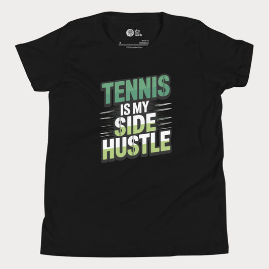 Girls tennis t-shirt with 'Tennis Is My Side Hustle' slogan, celebrating hustle and grit during hard court season.