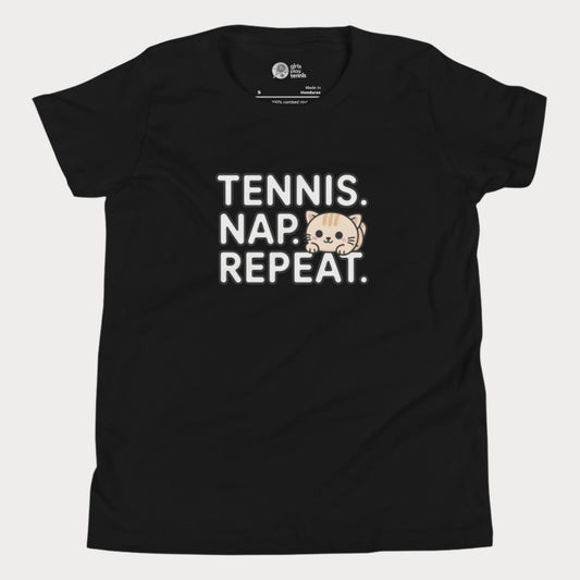 Black kids tennis t-shirt with “Tennis. Nap. Repeat.” text and a cute cartoon cat illustration, part of the Girls Play Tennis apparel line.