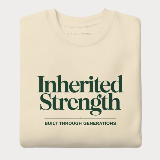 Folded bone Inherited Strength women's tennis crewneck sweatshirt with forest green lettering reading Inherited Strength above the line Built Through Generations