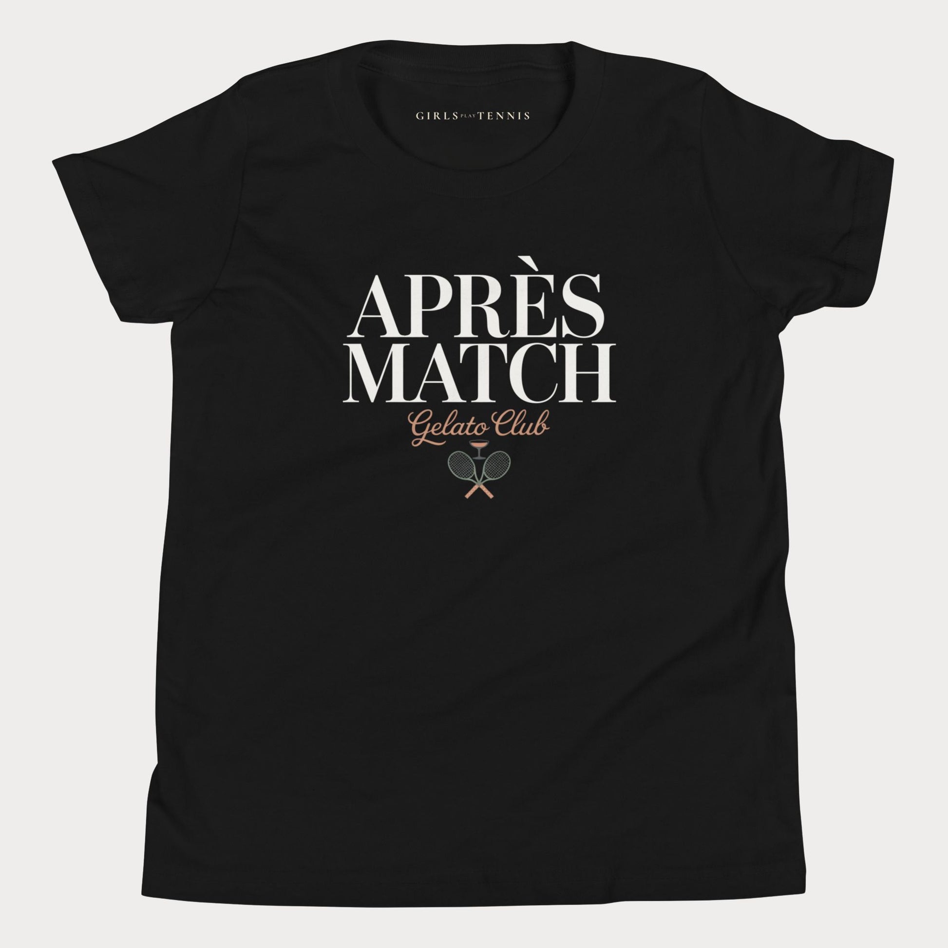 A black short-sleeve crewneck girls tennis t-shirt with a graphic print on the front reading 'APRÈS MATCH Gelato Club' in white and brown lettering, featuring crossed tennis rackets. The inner neck label shows 'GIRLS PLAY TENNIS'.