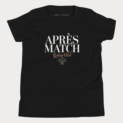 A black short-sleeve crewneck girls tennis t-shirt with a graphic print on the front reading 'APRÈS MATCH Gelato Club' in white and brown lettering, featuring crossed tennis rackets. The inner neck label shows 'GIRLS PLAY TENNIS'.