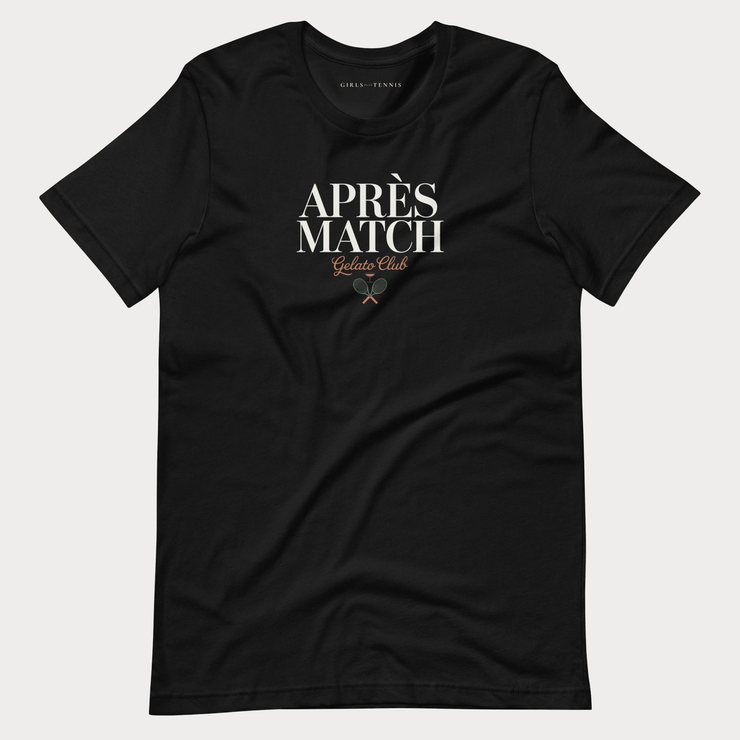 A black short-sleeve crewneck women's tennis t-shirt with a graphic on the chest reading 'APRÈS MATCH Gelato Club' in white and gold, displayed against a light gray background.
