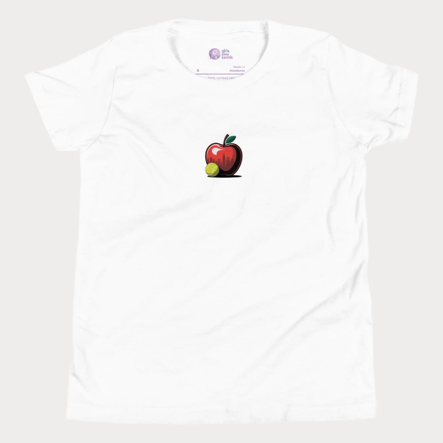 Big Apple tennis t-shirt for girls featuring apple with NYC skyline and tennis ball design.