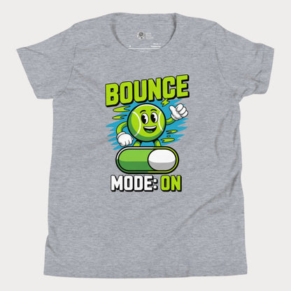 Grey kids’ tennis t-shirt featuring a cartoon tennis ball with the text “Bounce Mode: ON” in green and white lettering.