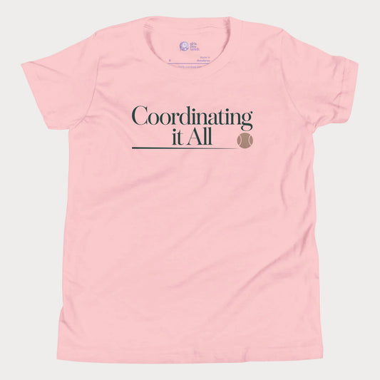 Coordinating It All tennis tee in soft pink with minimalist typography and tennis ball detail for women
