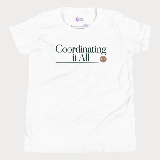 Coordinating It All tennis tee in white with minimalist typography and tennis ball detail for women