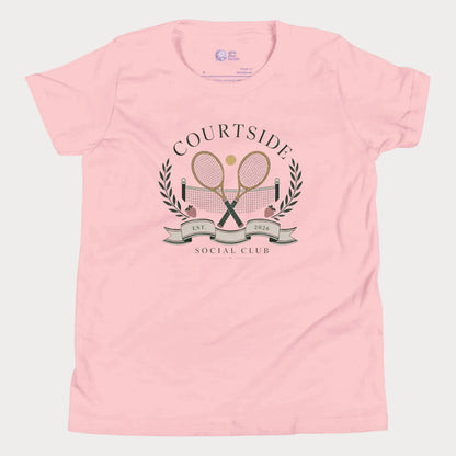 Soft pink girls tennis tee featuring vintage-inspired courtside social club artwork and crossed racquets