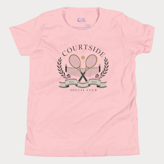Soft pink girls tennis tee featuring vintage-inspired courtside social club artwork and crossed racquets