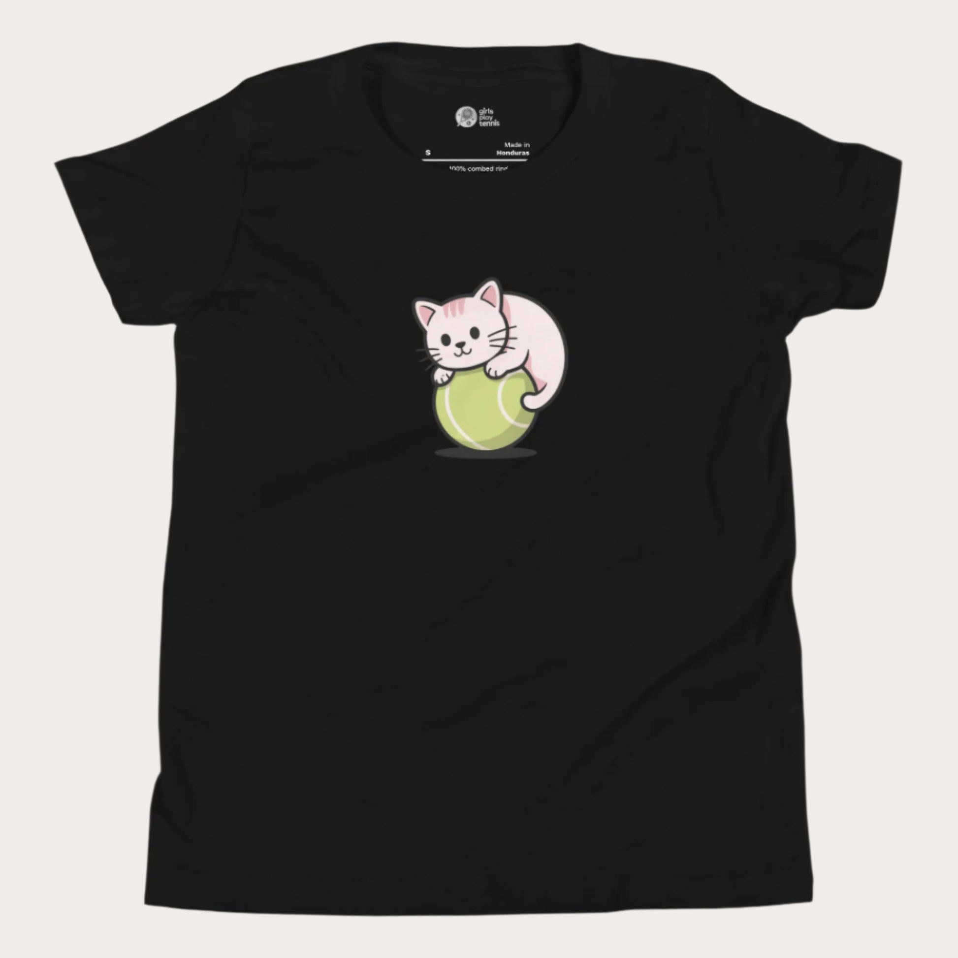 Black girls’ tennis t-shirt featuring a cute kitten playfully curled around a bright green tennis ball in the center of the chest - a fun and whimsical design perfect for young tennis players who love animals and the game.