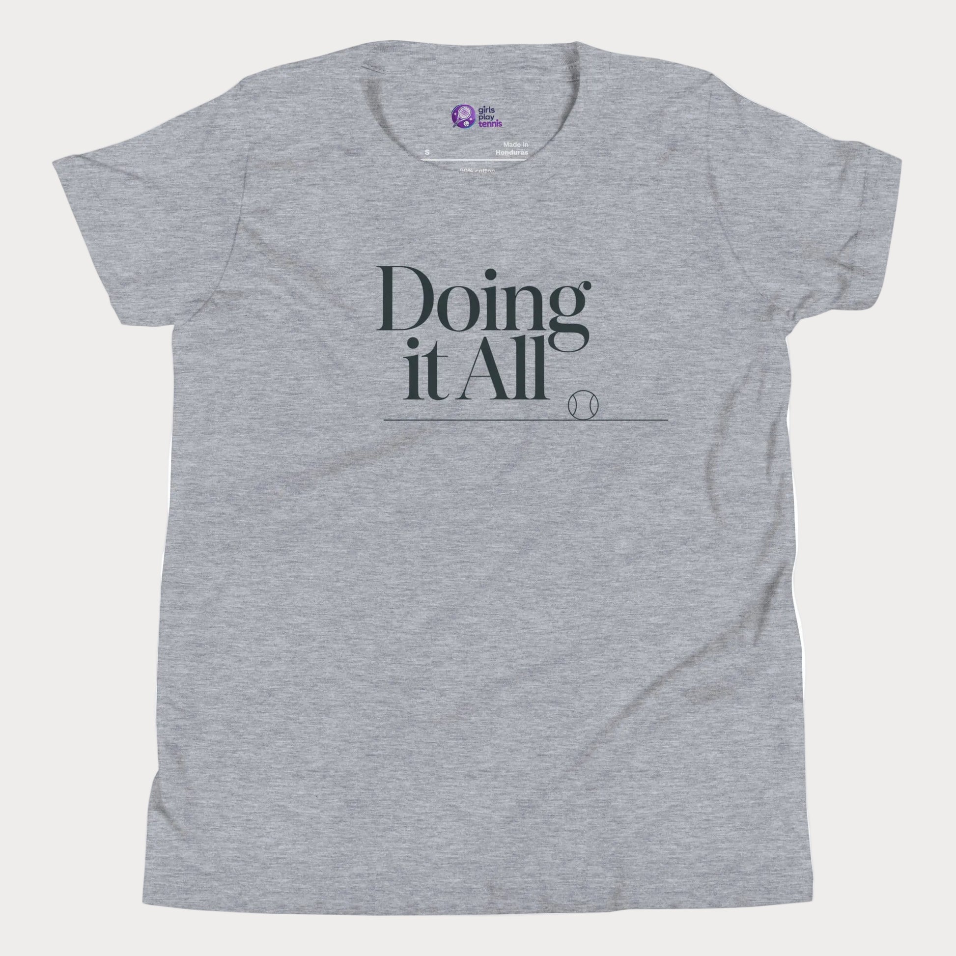 Doing It All tennis tee in athletic grey with minimalist white typography and tennis detail for women and girls
