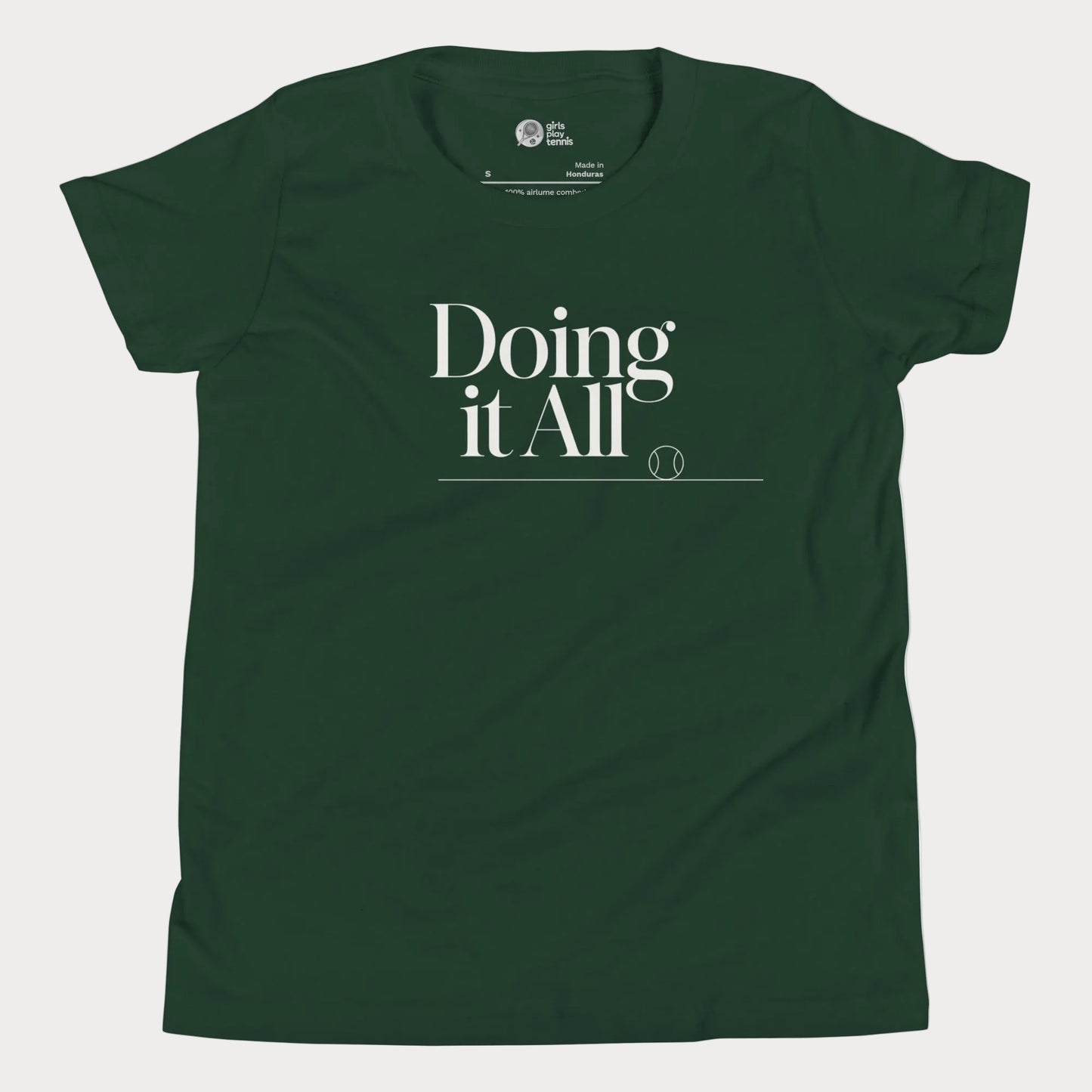 Doing It All tennis tee in forest green with minimalist white typography and tennis detail for women and girls