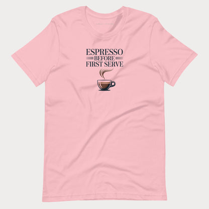 A light pink short-sleeve crewneck tennis lifestyle t-shirt featuring a graphic print on the chest that reads 'ESPRESSO BEFORE FIRST SERVE' above an illustration of a coffee cup with steam.