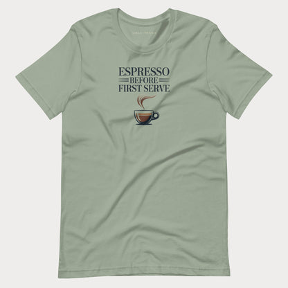 A sage green crewneck tennis lifestyle t-shirt for women with a graphic print that reads 'ESPRESSO BEFORE FIRST SERVE' above a coffee cup illustration, displayed flat against a light gray background.