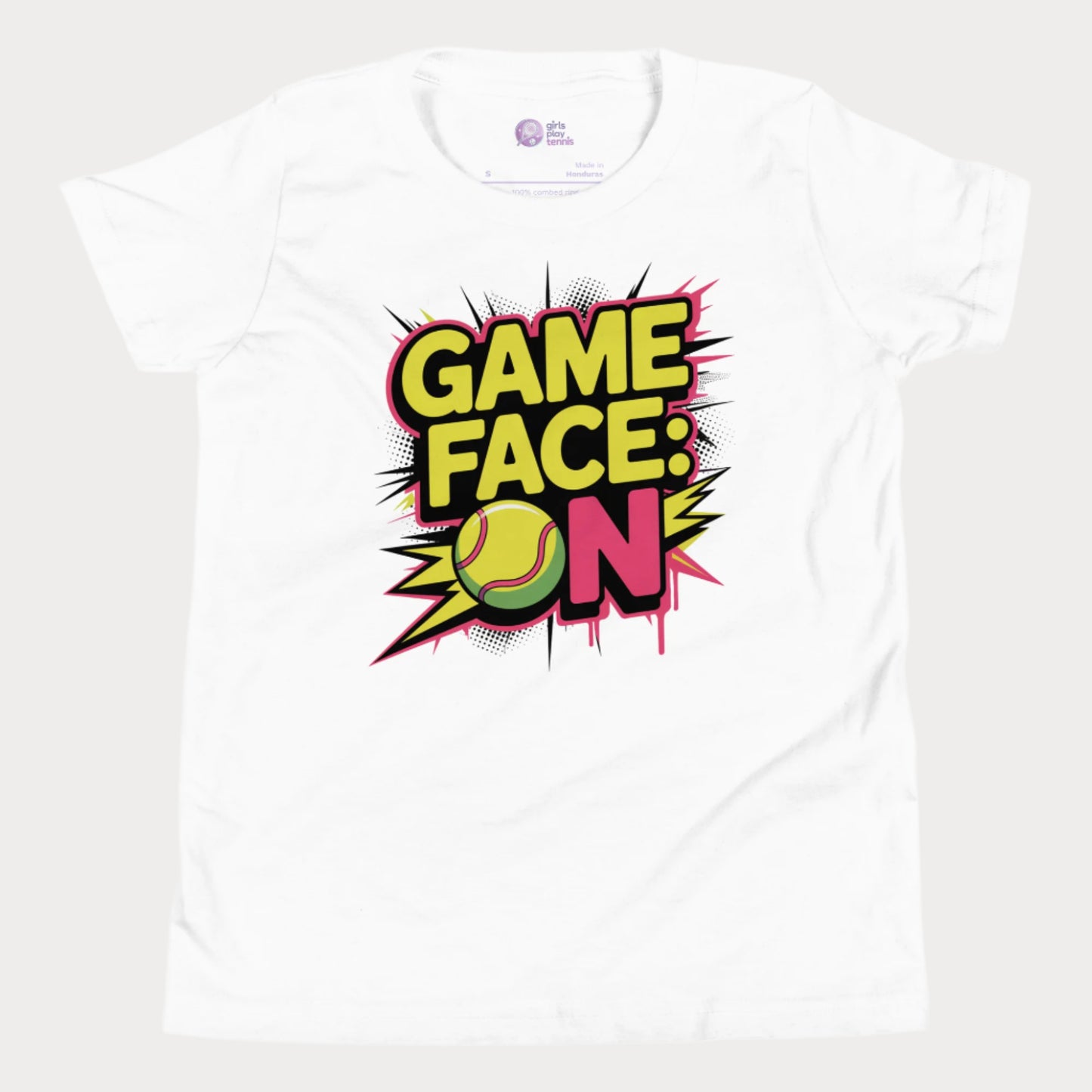 White kids tennis t-shirt with bold comic-style "Game Face: ON" graphic and tennis ball illustration.