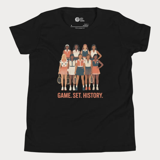 Black kids tennis t-shirt with illustration of 9 vintage-style female tennis players and the phrase “Game. Set. History.” honoring women’s tennis pioneers.