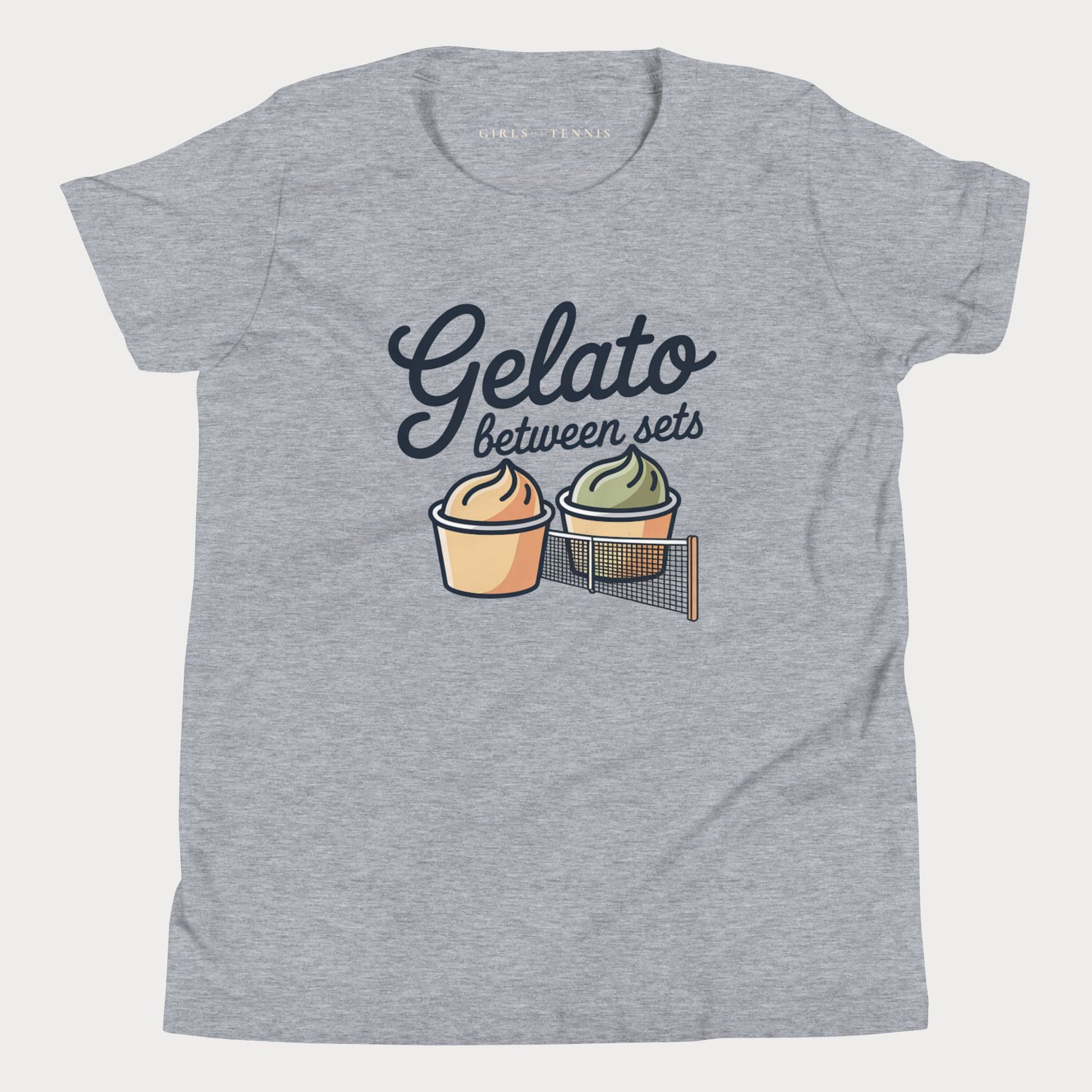 A heather gray short-sleeve t-shirt with a graphic print that reads 'Gelato between sets' above two illustrated gelato cups on a tennis net.