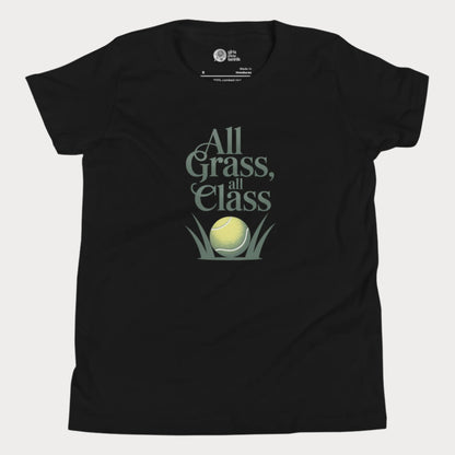 Black girls’ tennis T-shirt with green text “All Grass, All Class” and tennis ball in grass graphic.