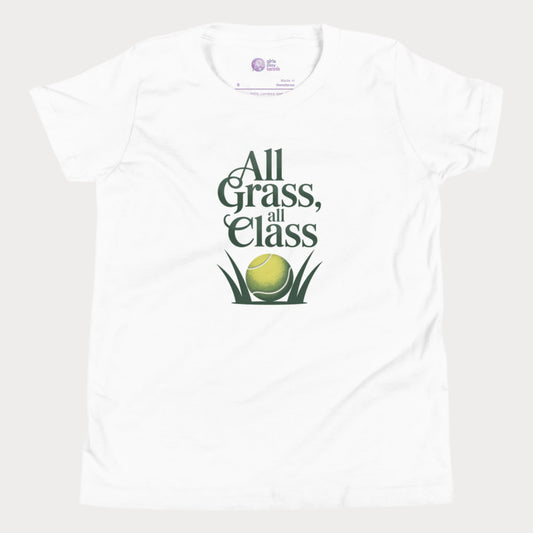 White girls’ tennis T-shirt with green text “All Grass, All Class” and tennis ball in grass graphic.