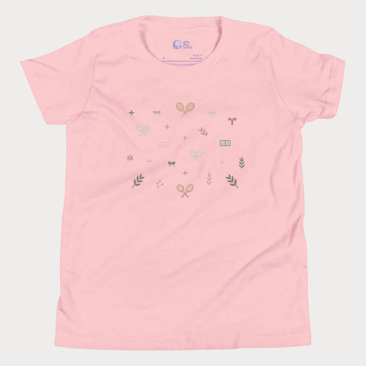 Soft pink girls tennis tee featuring minimalist tennis icons, bows, racquets, and lifestyle-inspired details