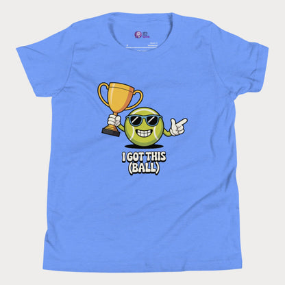 Blue girls tennis t-shirt with trophy-holding tennis ball character and “I Got This (Ball)” slogan. 