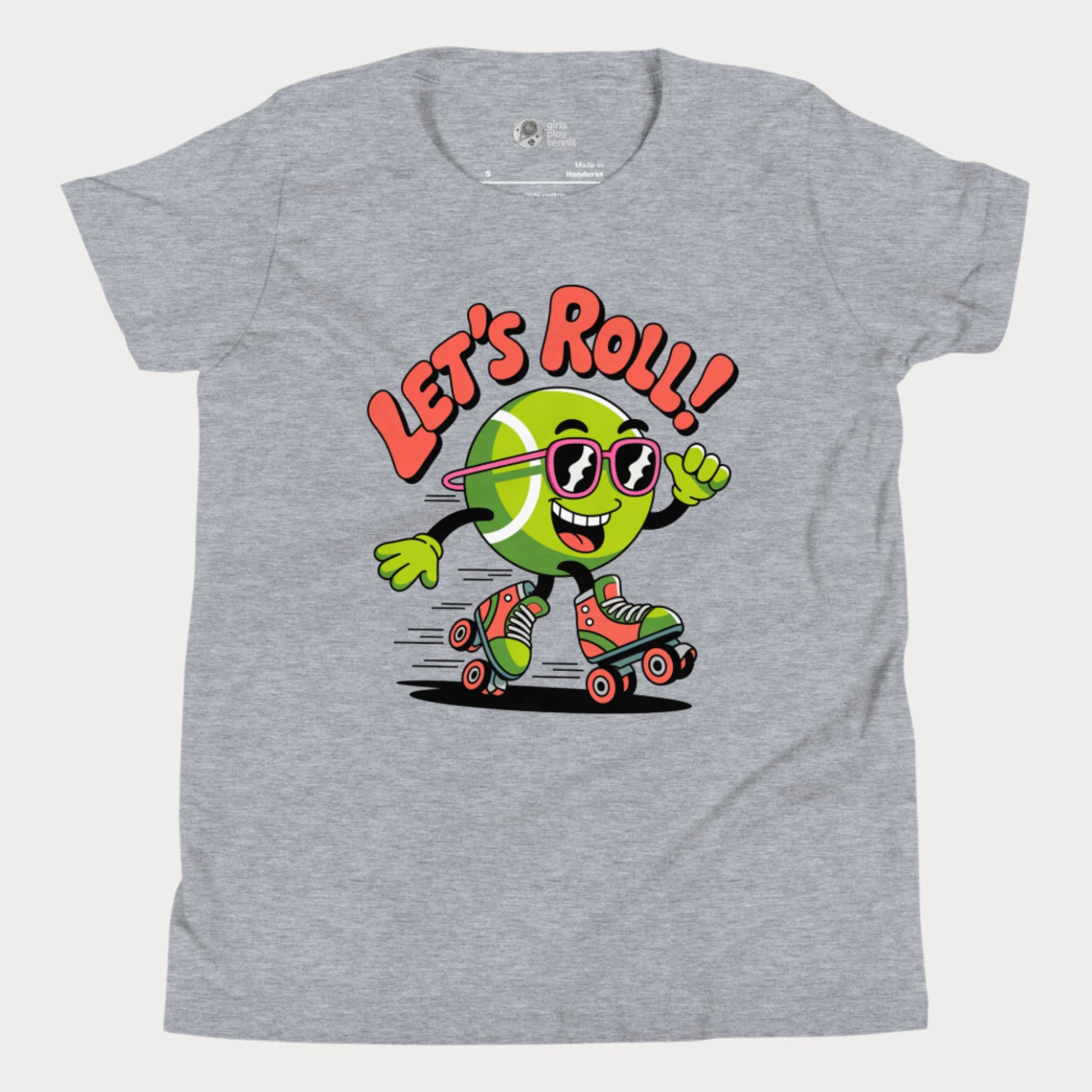 Grey girls t-shirt featuring a cartoon tennis ball wearing sunglasses and roller skates with the phrase “Let’s Roll!”