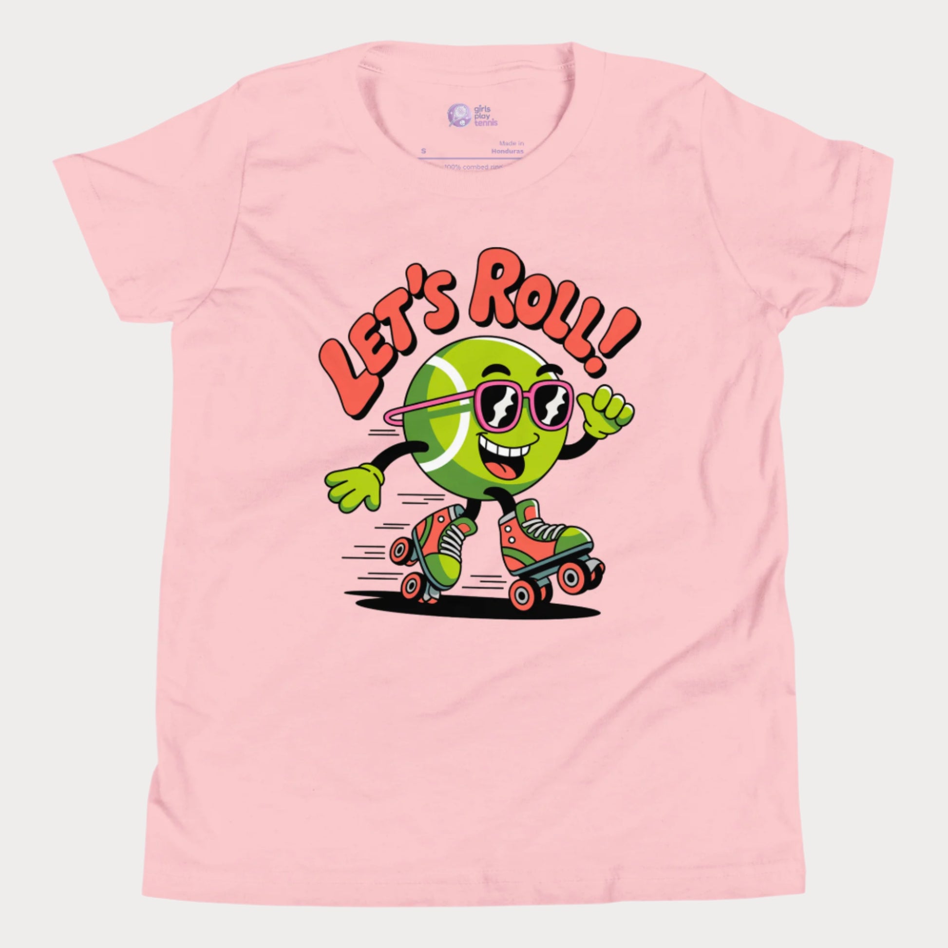 Pink girls t-shirt featuring a cartoon tennis ball wearing sunglasses and roller skates with the phrase “Let’s Roll!”