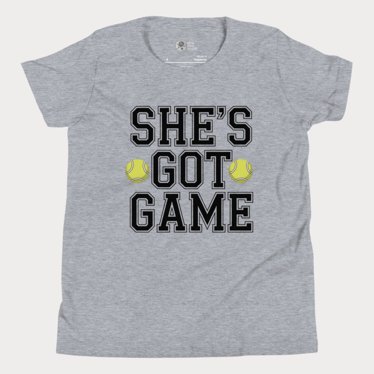 Youth tennis t-shirt with empowering slogan “She’s Got Game” and tennis ball accents.