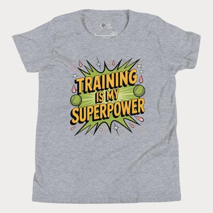 Girls tennis t-shirt with “Training Is My Superpower” slogan and energetic comic-style design.