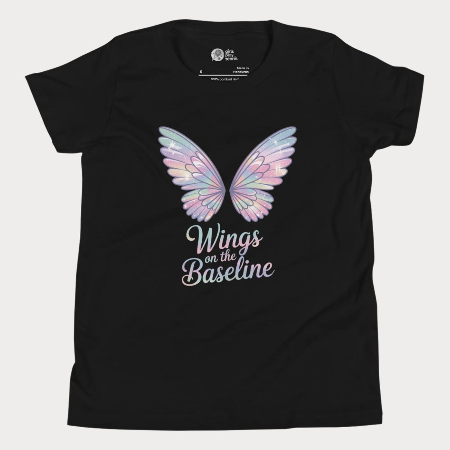 Black girls tennis t-shirt with pastel fairy wings and “Wings on the Baseline” text – whimsical tennis design.