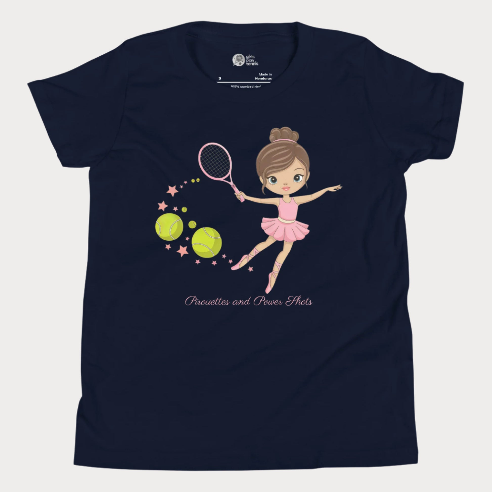 Adorable navy girls' tennis t-shirt featuring a ballerina in a pink tutu gracefully swinging a tennis racket, with stars and tennis balls trailing behind.
