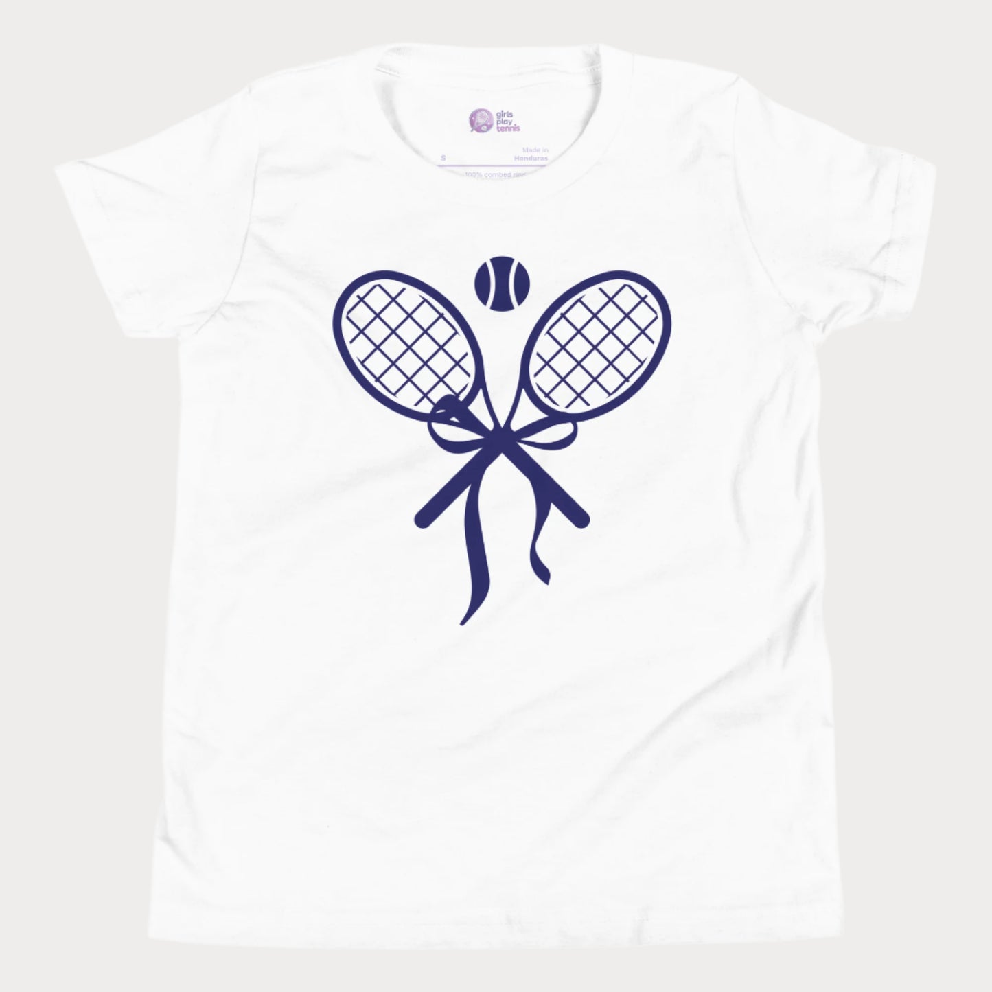 Cute girls' tennis t-shirt in berry featuring a stylish design of two crossed tennis rackets tied with a bow and a tennis ball above.