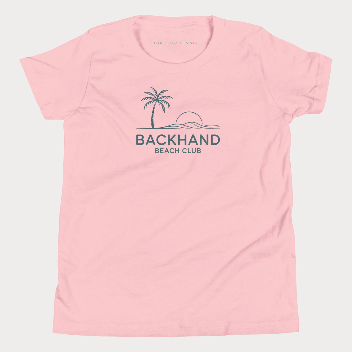 Pink Backhand Beach Club girls' tennis T-shirt with a palm tree, sun and waves graphic
